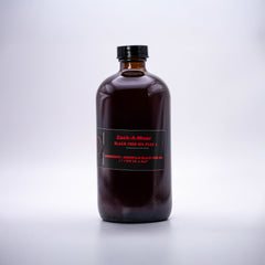 Zack-A-Moor Black Seed Oil Plus 16oz bottle with a dark label and sleek design, placed on a light background.